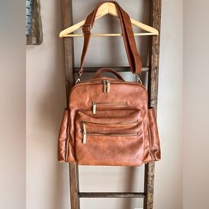 The Honest Company's Cross Country Diaper Bag Cognac Converts to Backpack